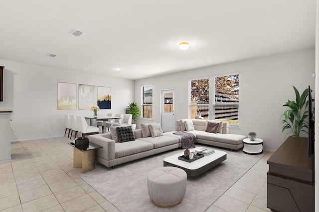 living room with light tile patterned flooring