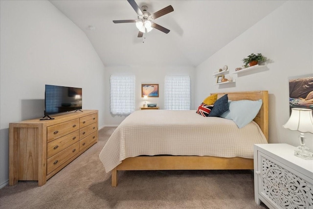 bedroom with carpet flooring, ceiling fan, and vaulted ceiling