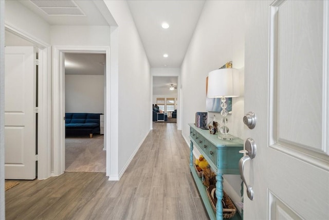 hallway featuring light hardwood / wood-style floors