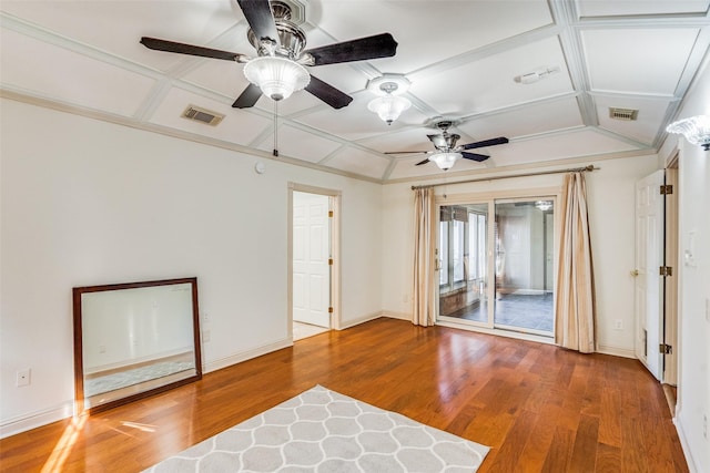 spare room with hardwood / wood-style floors, ceiling fan, and coffered ceiling