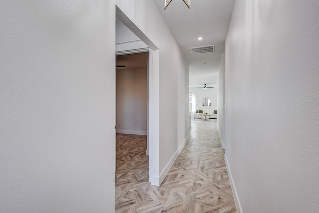 hallway with light parquet floors