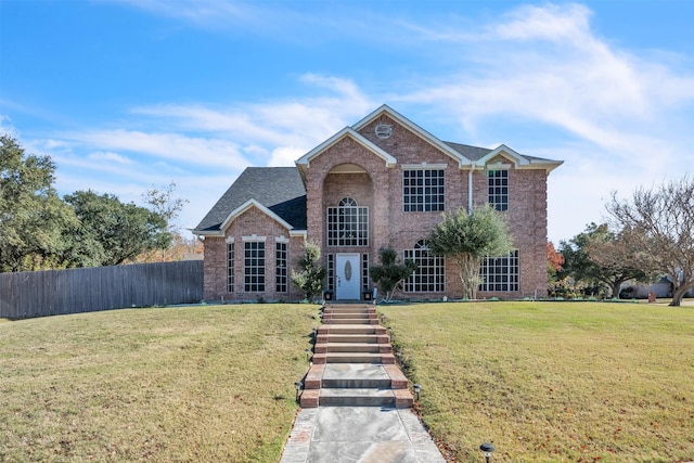 front facade with a front yard