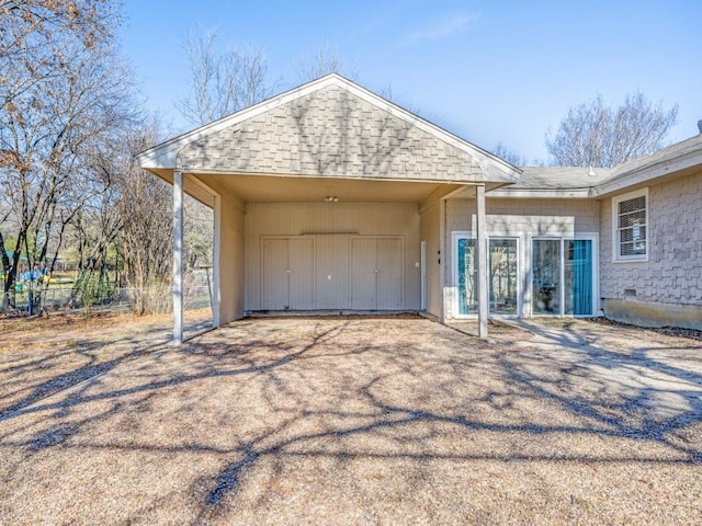 exterior space with a garage