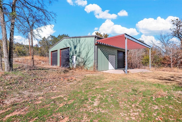 view of outbuilding with a garage