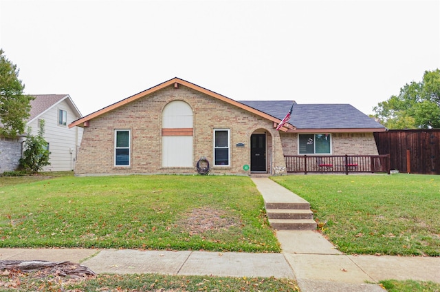 ranch-style home with a front yard