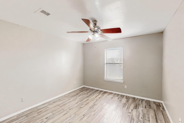 unfurnished room with light hardwood / wood-style floors and ceiling fan