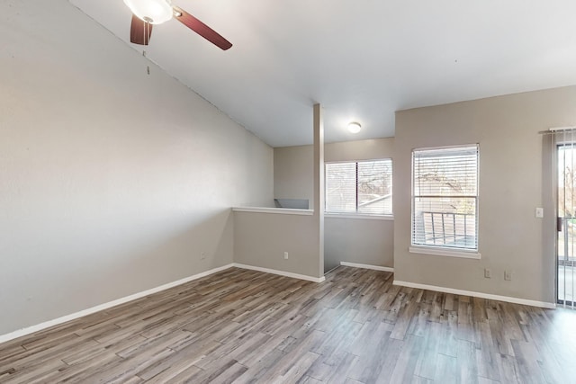 spare room featuring ceiling fan and light wood-type flooring