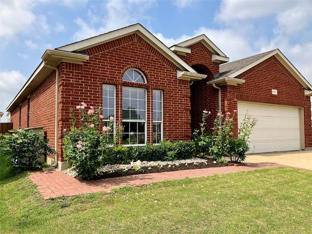 front facade featuring a garage and a front yard