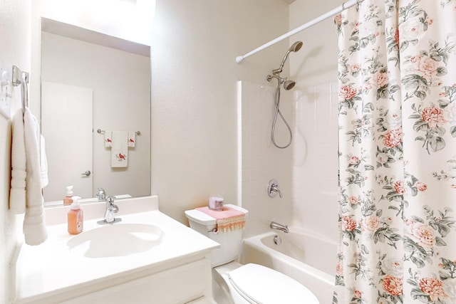 full bathroom with shower / bathtub combination with curtain, vanity, and toilet