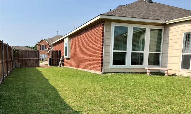 view of home's exterior featuring a lawn