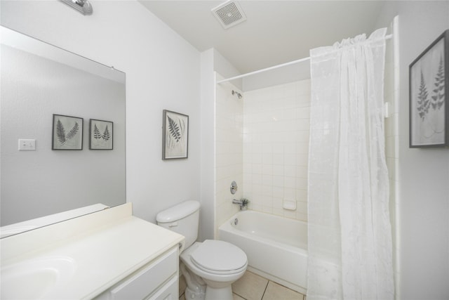 full bathroom with tile patterned floors, vanity, toilet, and shower / bath combo