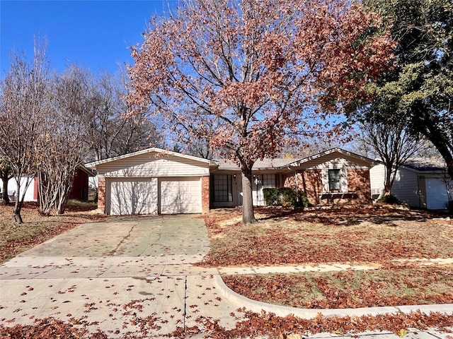 single story home with a garage