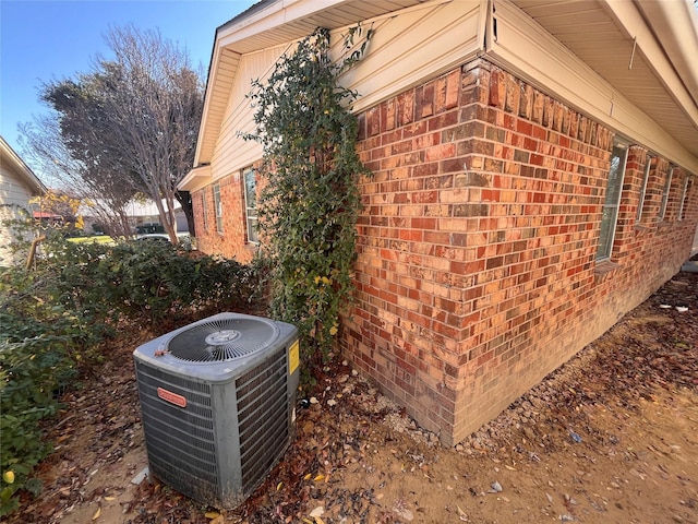 view of property exterior with central air condition unit