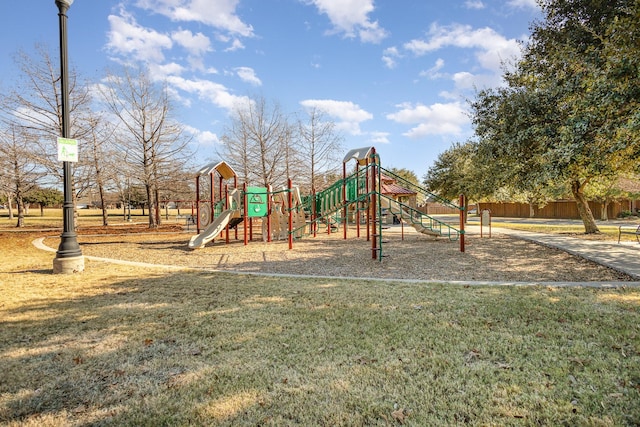 view of playground featuring a lawn