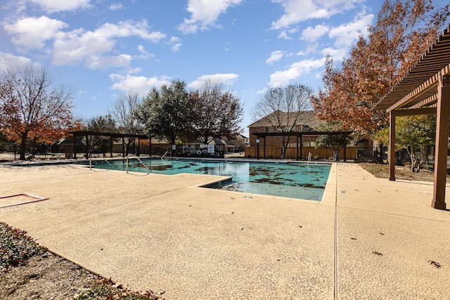 view of pool featuring a patio and a pergola