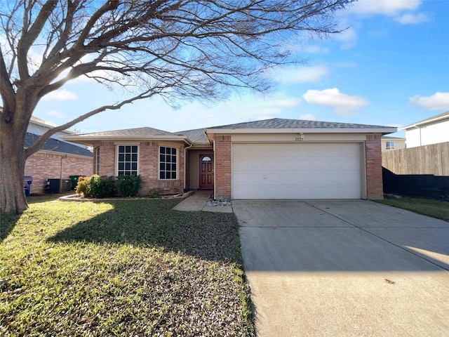 ranch-style home featuring central AC unit, a garage, and a front lawn