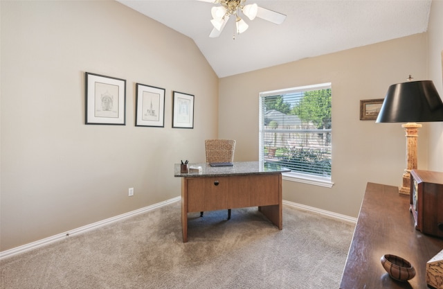 office with ceiling fan, carpet, and lofted ceiling