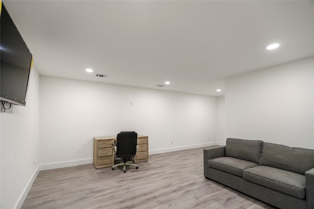 office area with light hardwood / wood-style flooring