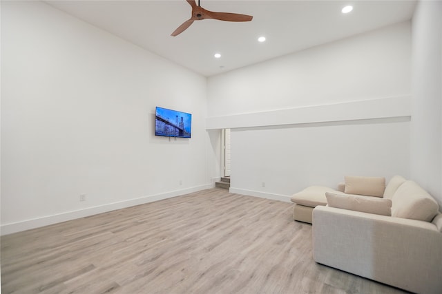 sitting room featuring light hardwood / wood-style floors and ceiling fan