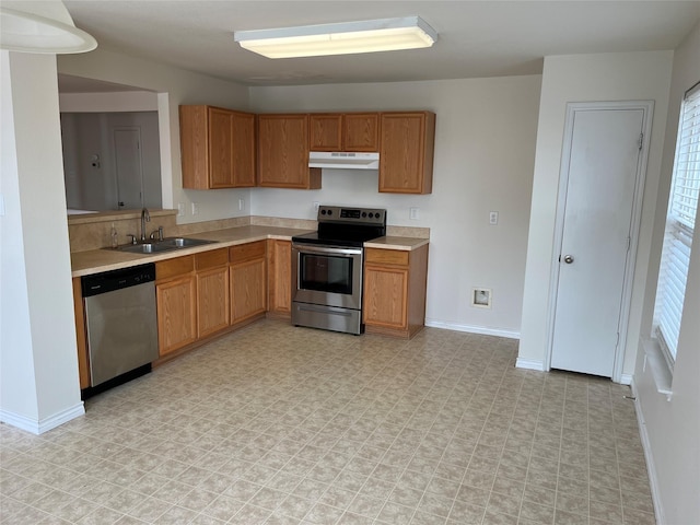 kitchen featuring appliances with stainless steel finishes and sink