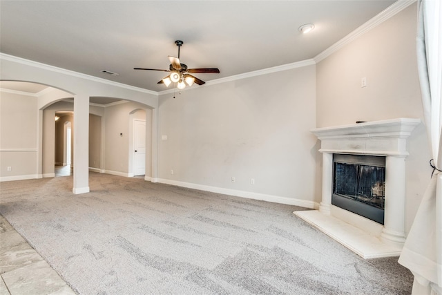 unfurnished living room with crown molding, ceiling fan, and light carpet