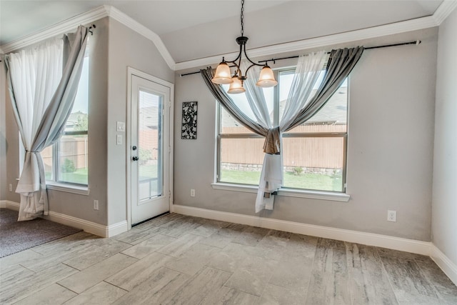 unfurnished dining area featuring an inviting chandelier, lofted ceiling, a healthy amount of sunlight, and light hardwood / wood-style flooring