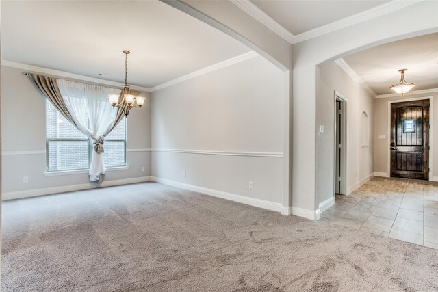 interior space with crown molding, a chandelier, and light carpet