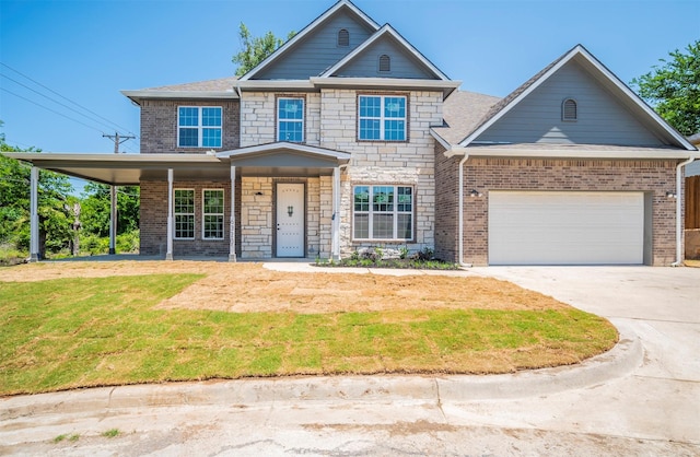 craftsman house featuring a garage and a front lawn