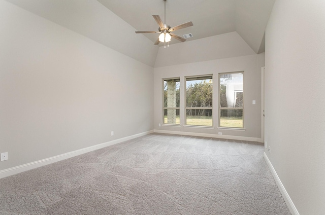 spare room with light carpet, ceiling fan, and lofted ceiling