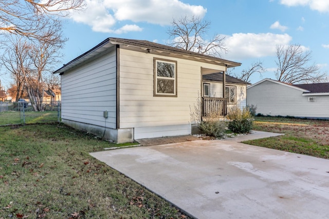 exterior space featuring a yard and a patio area