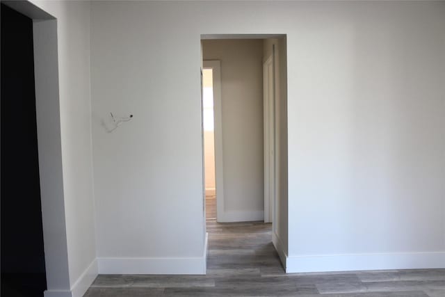 hallway featuring dark hardwood / wood-style floors