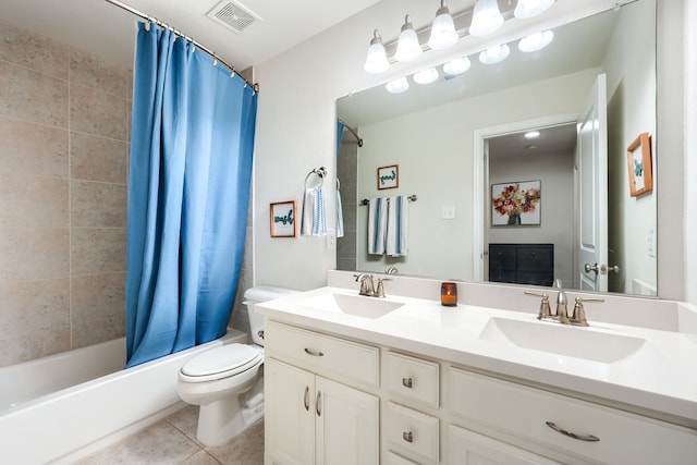 full bathroom with tile patterned floors, vanity, toilet, and shower / tub combo with curtain