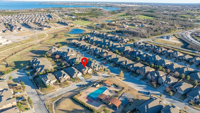 birds eye view of property featuring a water view