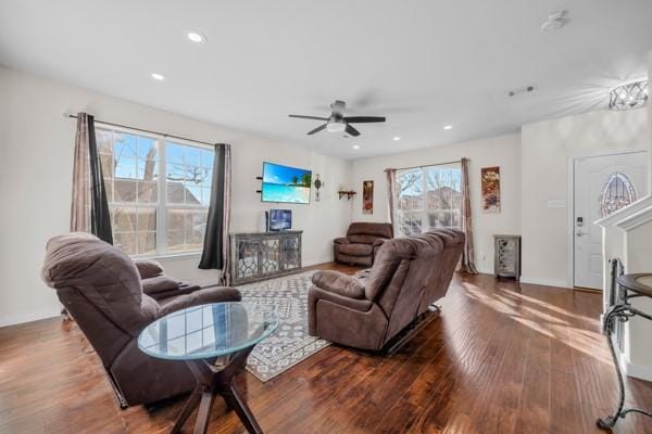 living room with ceiling fan and wood-type flooring