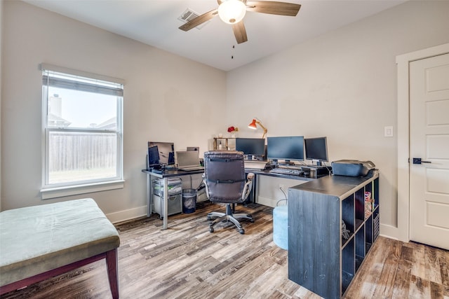 office space featuring hardwood / wood-style flooring and ceiling fan