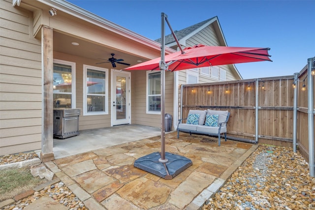 view of patio with ceiling fan