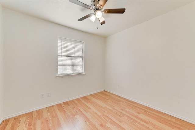 spare room with ceiling fan and light hardwood / wood-style flooring