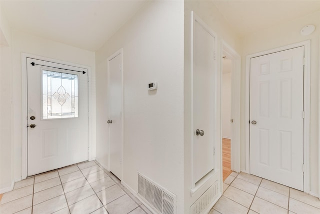 entrance foyer with light tile patterned flooring