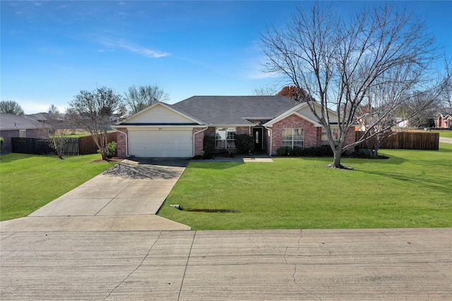 ranch-style home featuring a front lawn and a garage