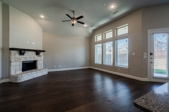 unfurnished living room featuring a fireplace, dark hardwood / wood-style flooring, ceiling fan, and lofted ceiling