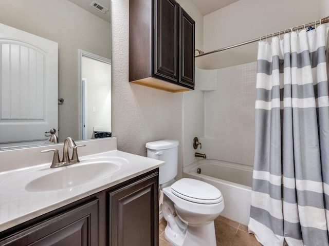 full bathroom with toilet, vanity, tile patterned floors, and shower / bath combination with curtain