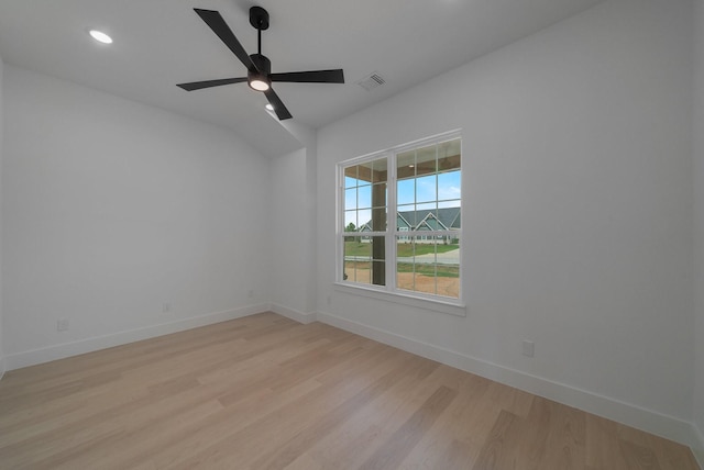 empty room with light hardwood / wood-style floors and ceiling fan