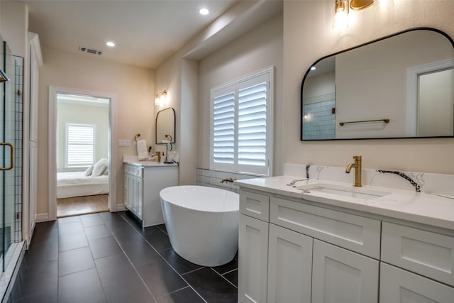 bathroom with tile patterned flooring, vanity, and independent shower and bath