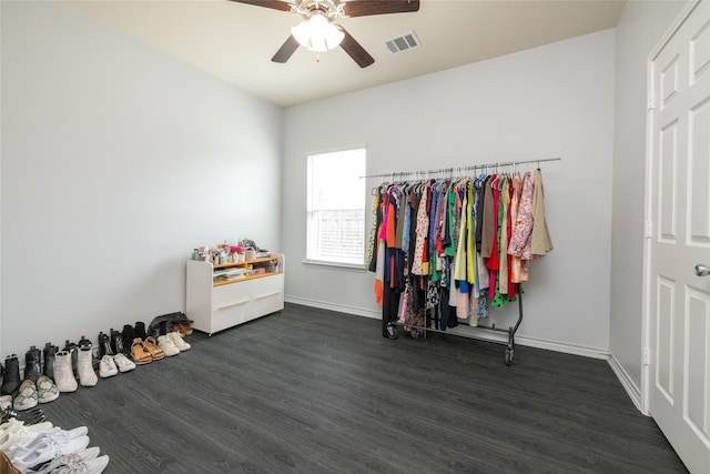 bedroom with dark hardwood / wood-style floors and ceiling fan