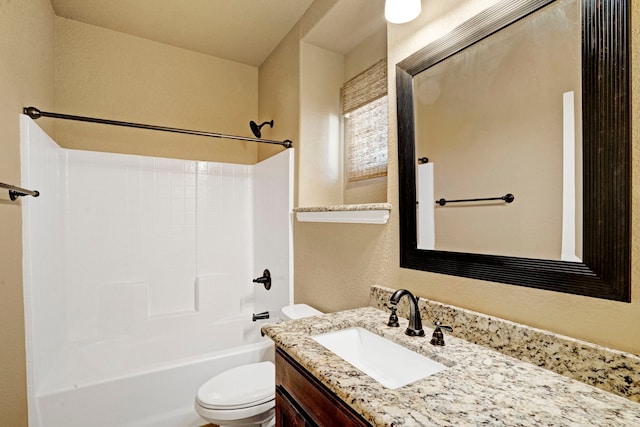 full bathroom featuring vanity, tub / shower combination, and toilet