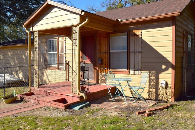 doorway to property with a deck