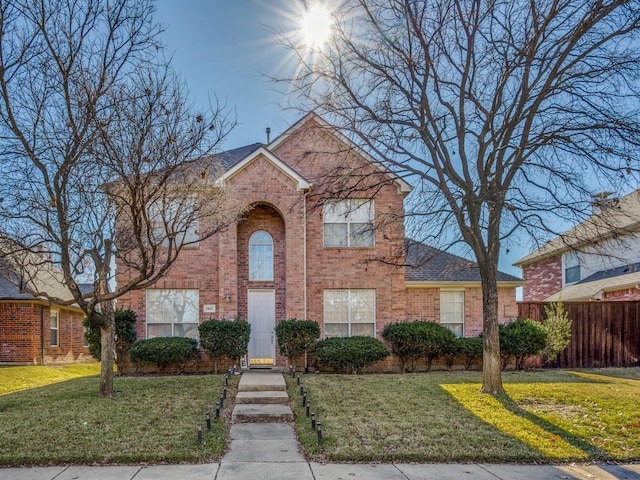 view of front facade with a front yard