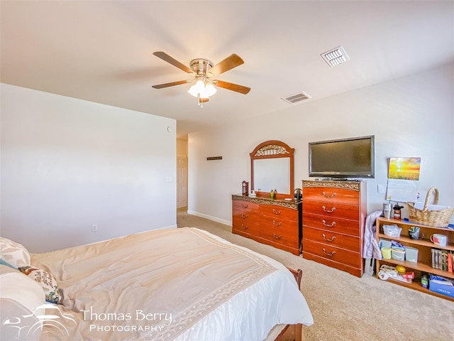 carpeted bedroom with ceiling fan