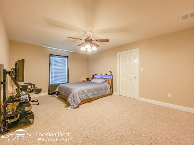 carpeted bedroom featuring ceiling fan