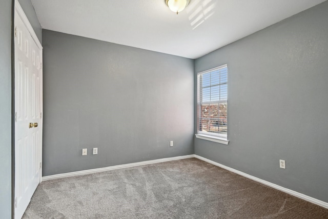 view of carpeted spare room